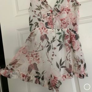 Floral Romper with peek-hole in the back